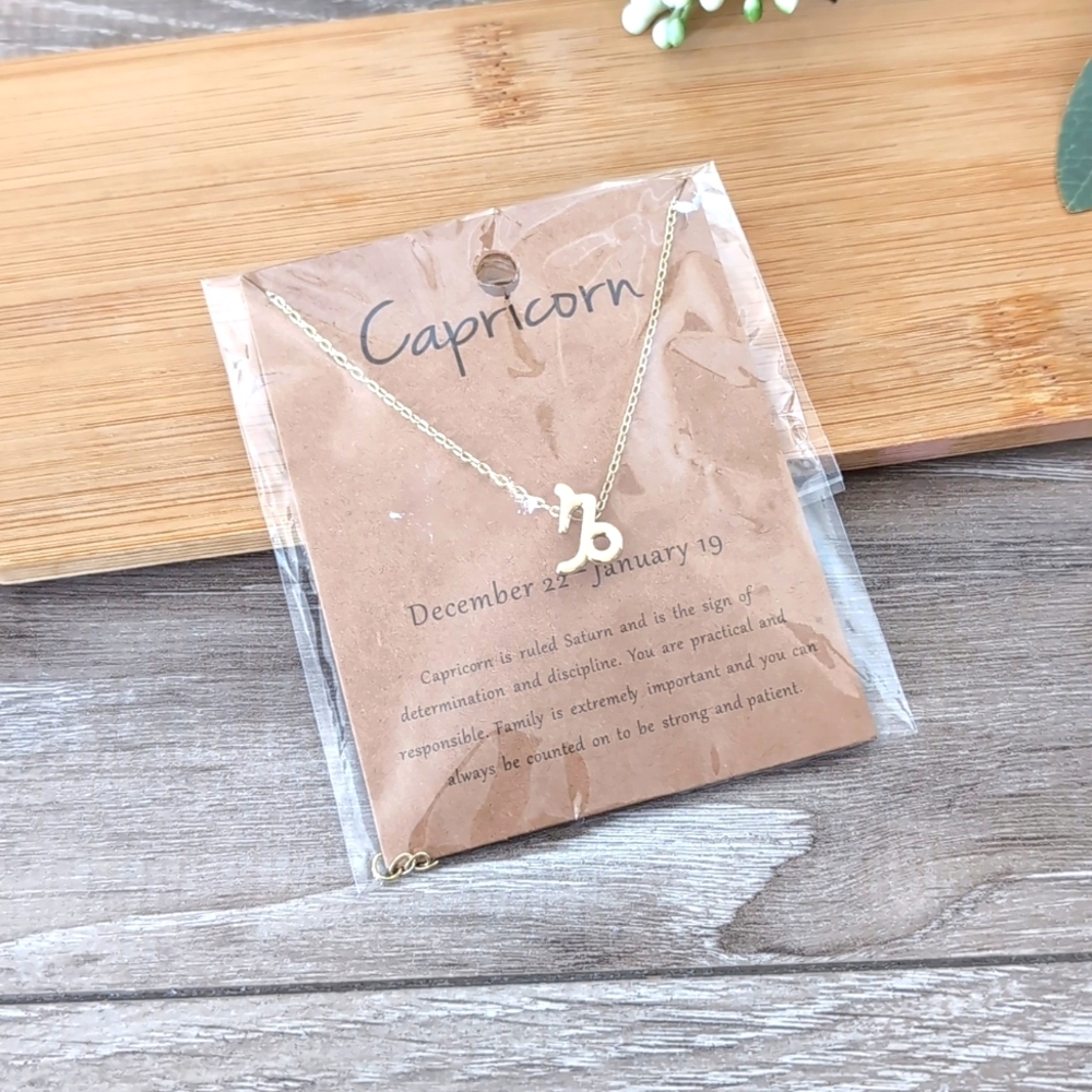 Gold Tone Capricorn Zodiac Necklace